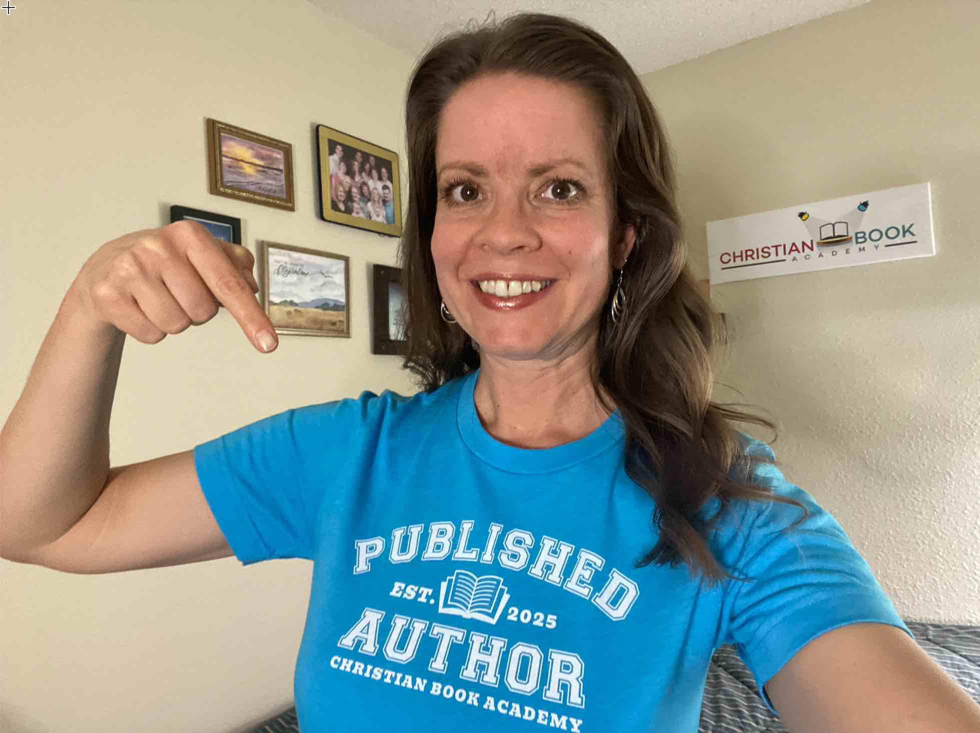 Shelley wearing the published author t-shirt